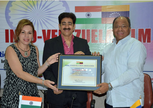 Augusto Montiel Chief Patron to Indo Venezuela Film Association Noida: “The enthusiasm, support and encouragement given by H.E. Augusto Montiel Ambassador of Venezuela to India has motivated International Chamber of Media And Entertainment Industry to launch Indo Venezuela Film Association,†said Sandeep Marwah President of ICMEI. “We are now powerful as H.E. Augusto Montiel has accepted to be the Patron of the organization.†added Sandeep Marwah while handing over the certificate of patron ship to the Ambassador at Noida Film City. “It is my honor and pleasure to be part of this newly constituted association. I am sure we will be able to reach to a new platform together,†said H.E. Augusto Montiel. Student, faculty and members of the administration of Asian Academy of Film And Television, Asian School of Media Studies and professionals attended the event from different strata of life. Mrs Mili Augusto also graced the occasion.